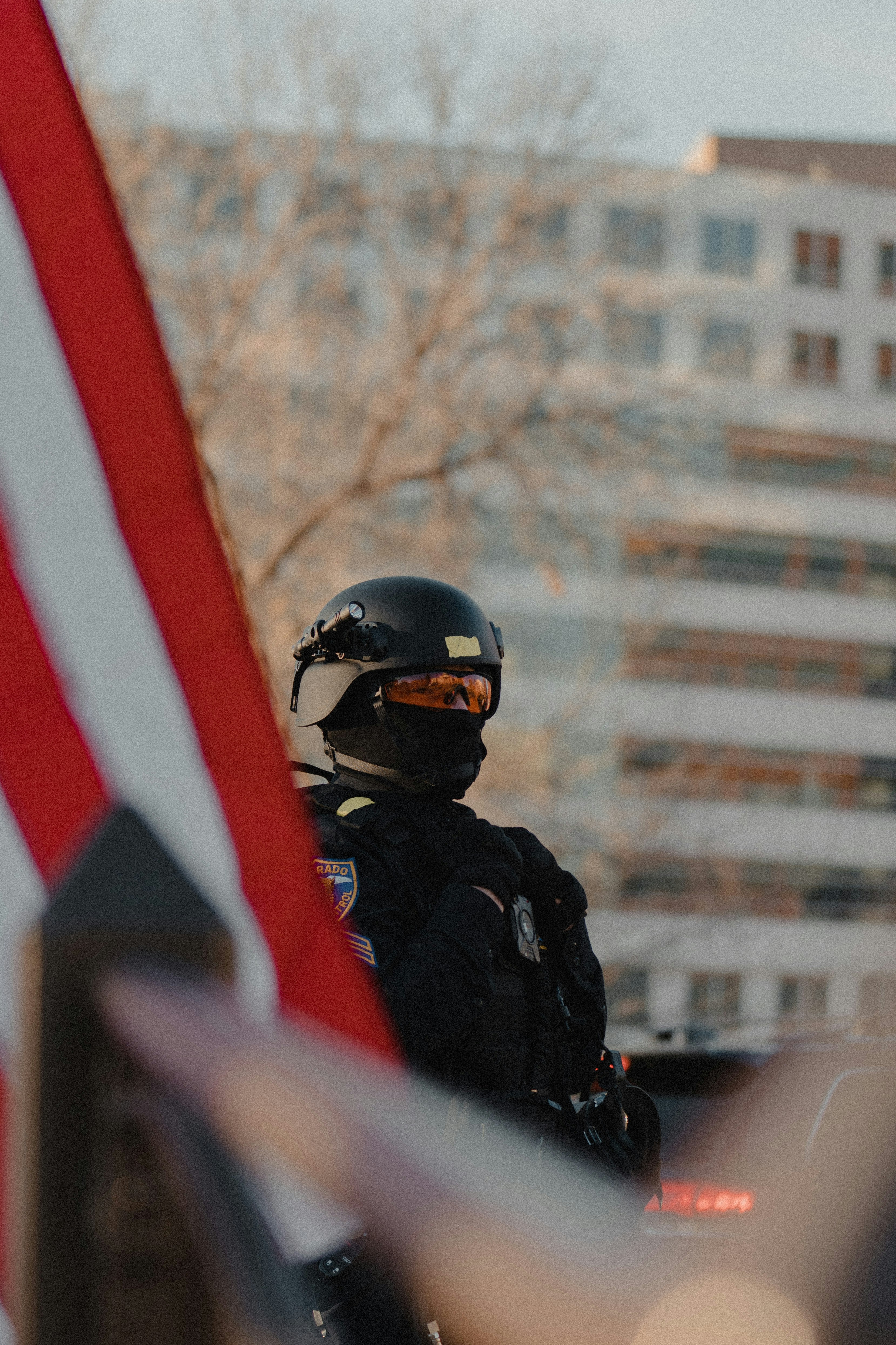 man in black jacket wearing helmet